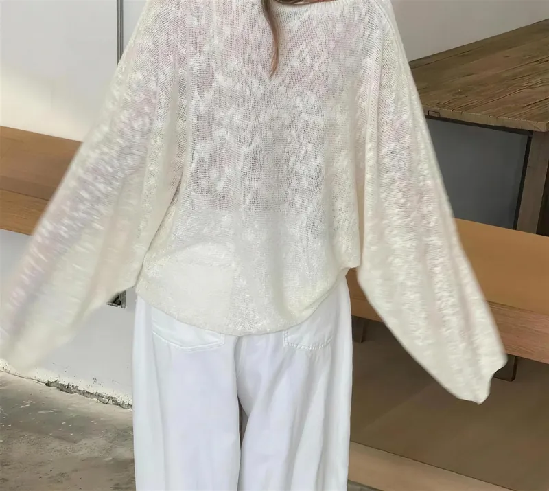 Back view showing the wide scooped boat neckline