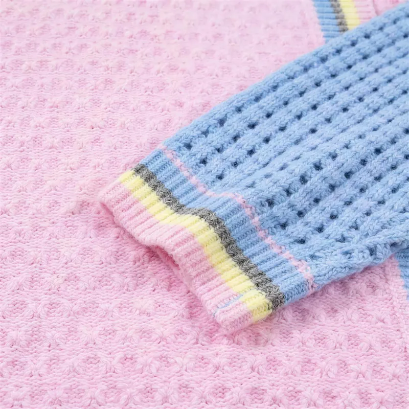 Close-up of the waffle knit and the striped rib cuff