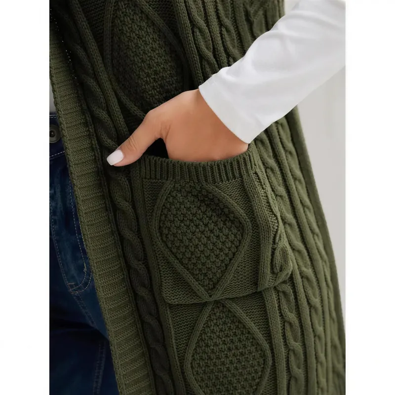 Close-up of the patch pocket on the cable knit vest