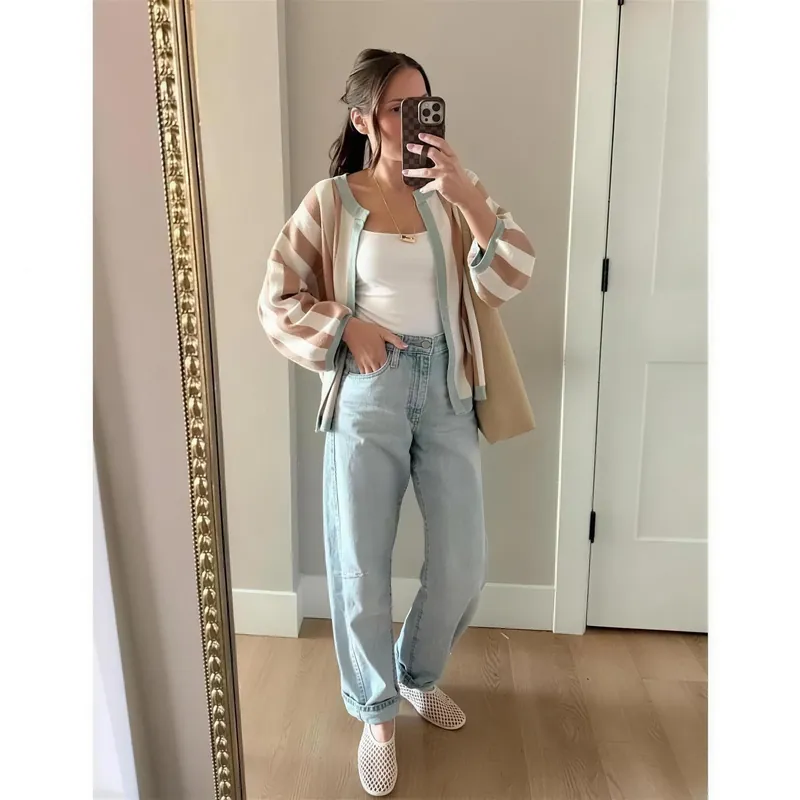 Striped balloon sleeve cardigan in Khaki, worn open over a tank with jeans