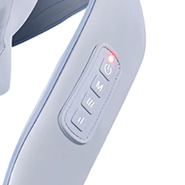 Detail of the four-button control panel on the right pad, with the power light on