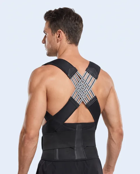 Man wearing the posture corrector, back view showing the cross back tension straps