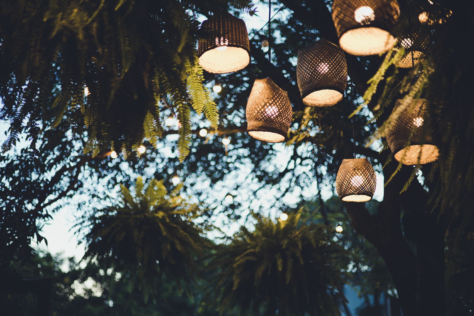 How to Layer Boho Outdoor Lighting: Styling Hanging vs. Tabletop Solar Lanterns