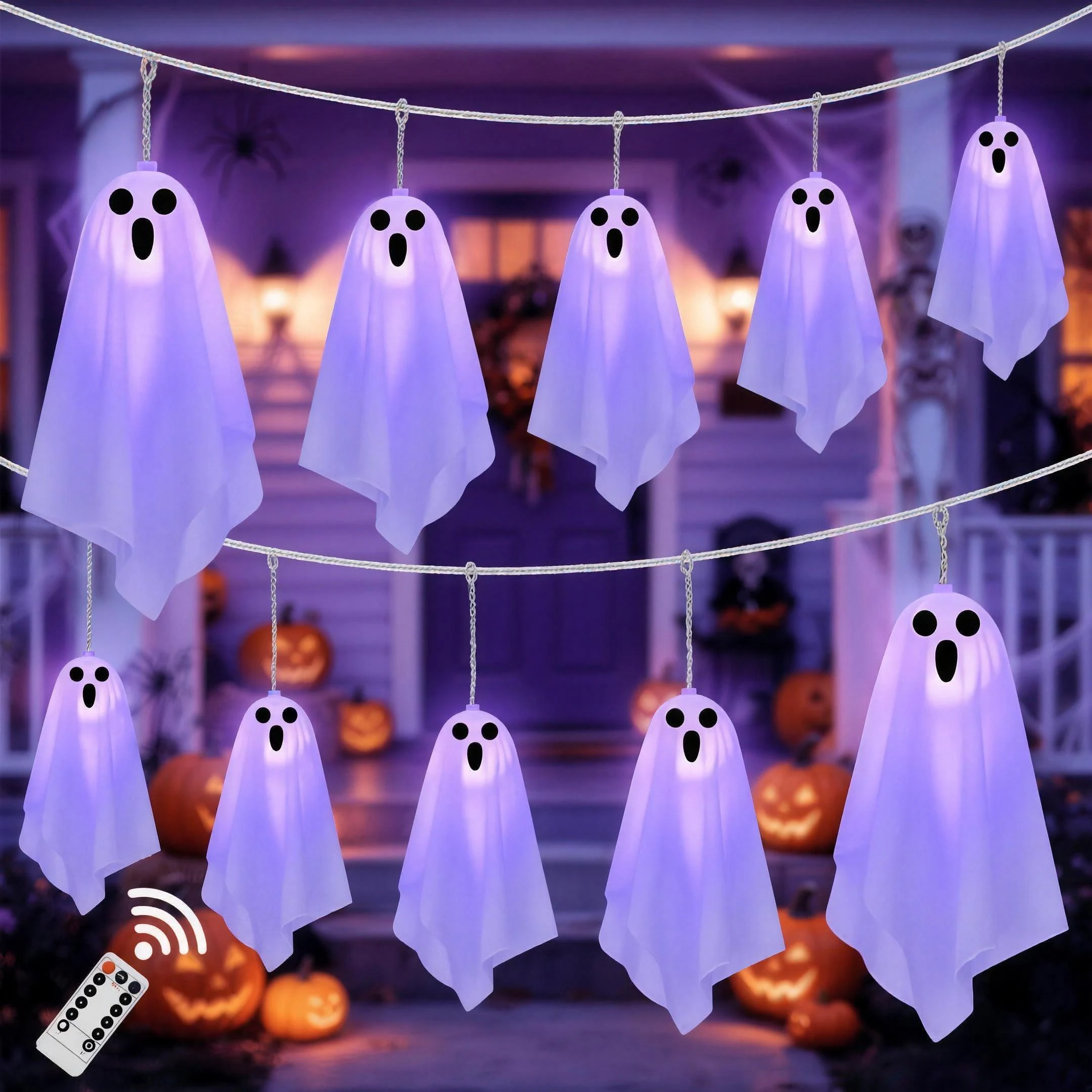 Purple fabric ghost lights hung in two swags across a porch, with the remote in the foreground