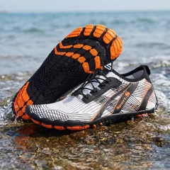 White and orange water shoes, sole detail