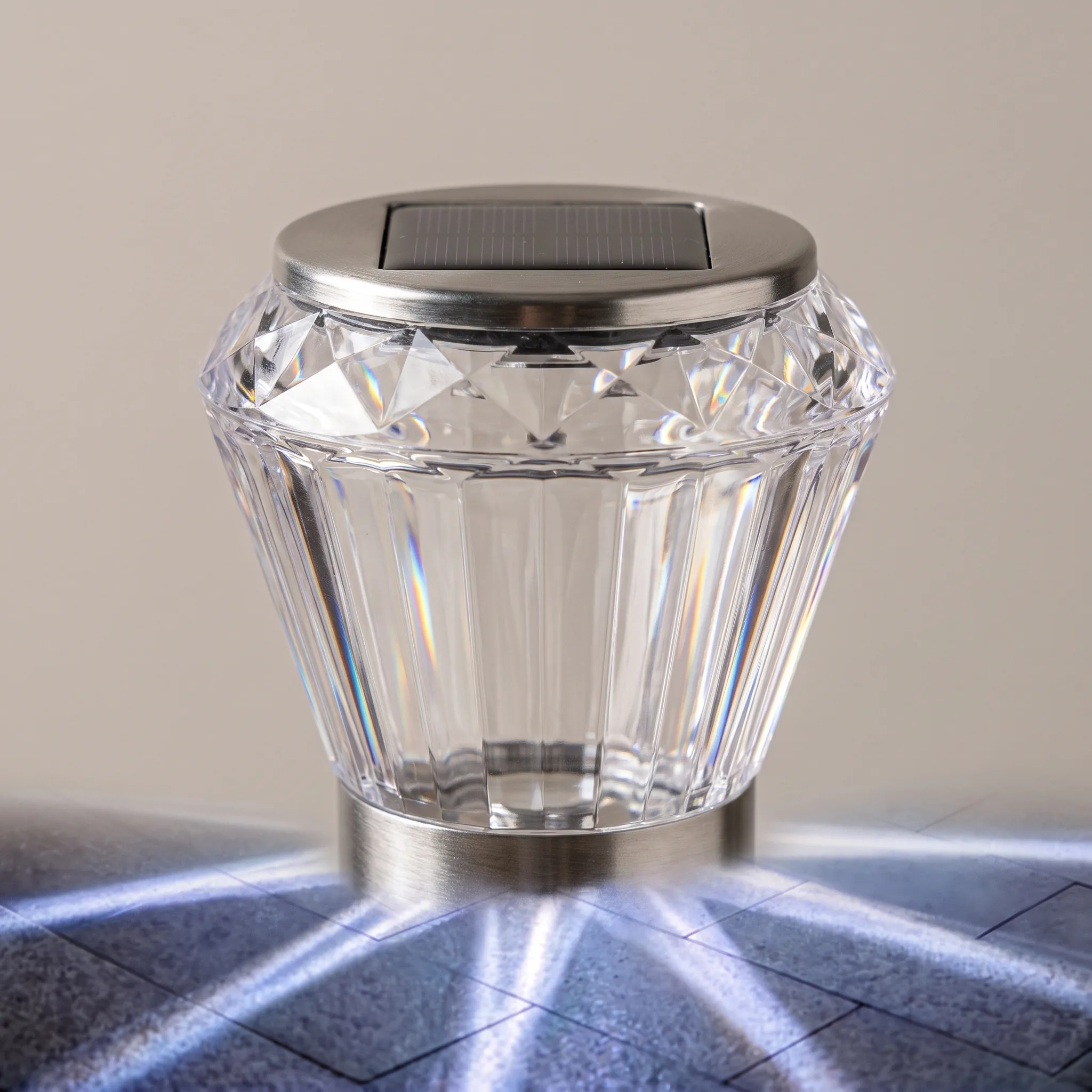 Faceted lens and solar cap detail