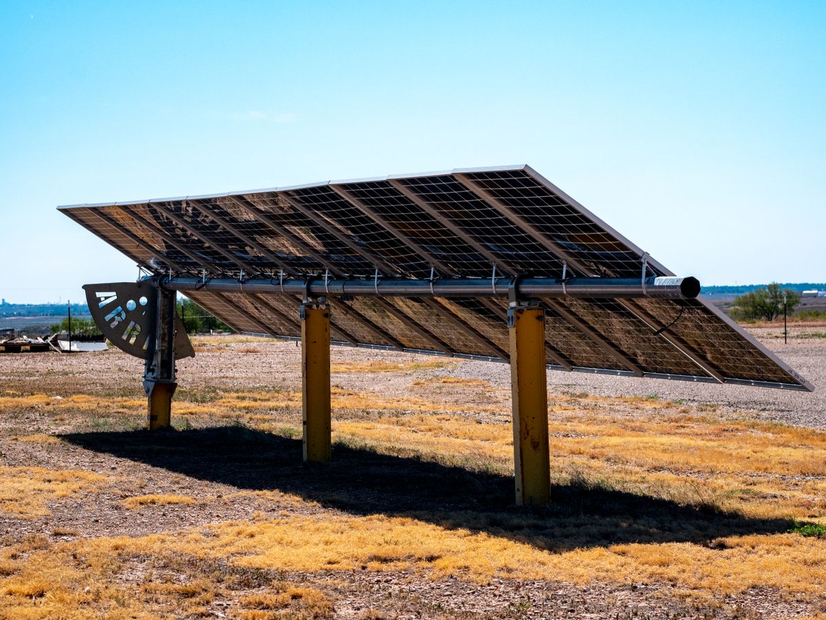 Outdoor solar panels in Amarillo, Texas with clear blue skies and dry landscape.