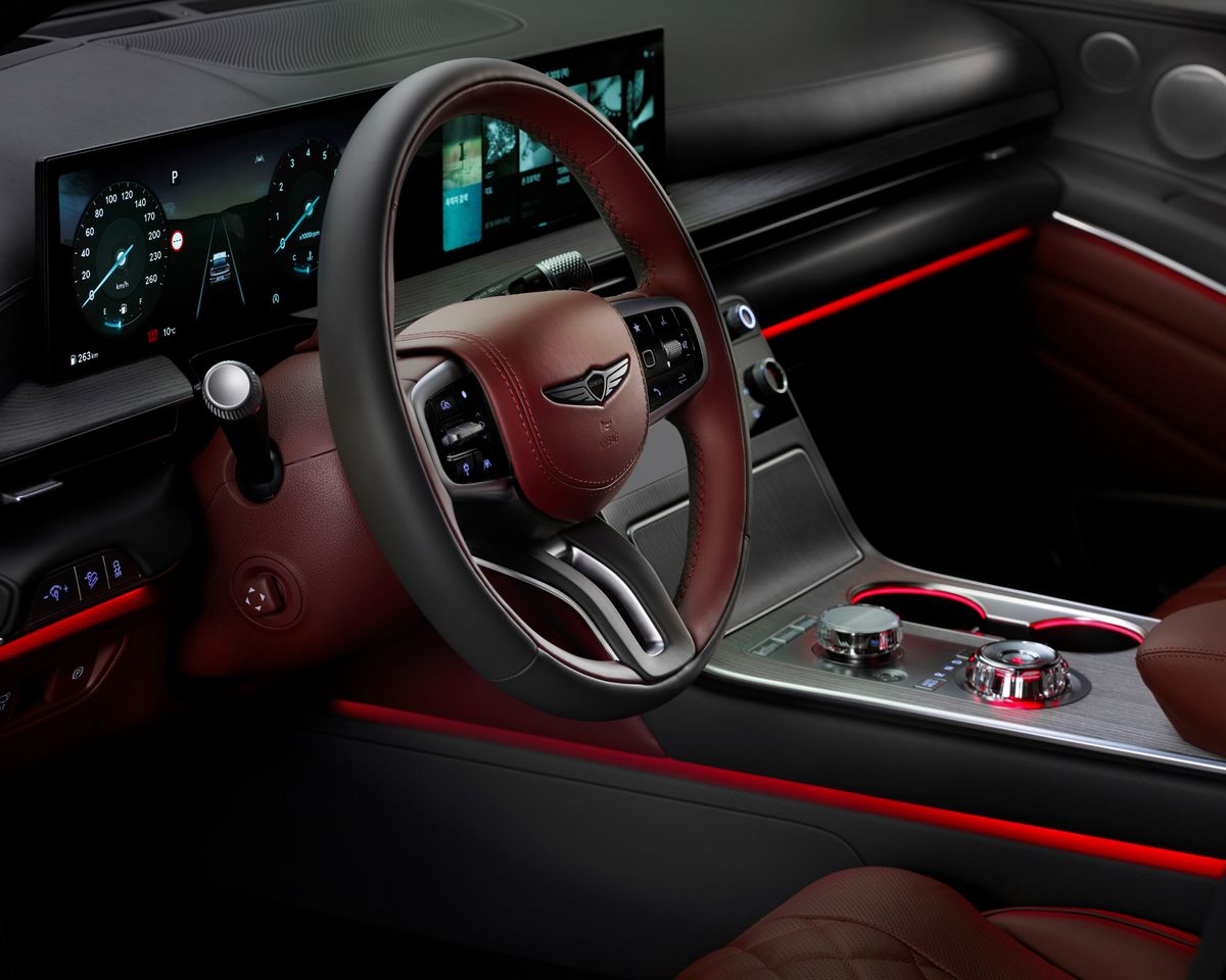 Elegant car interior featuring a modern digital dashboard and sophisticated design elements.