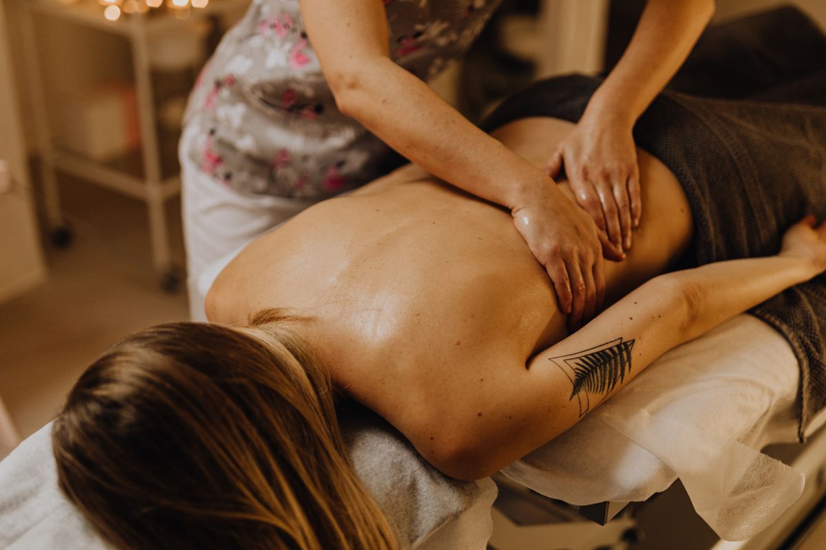 A soothing massage therapy session at a spa promoting relaxation and wellness.