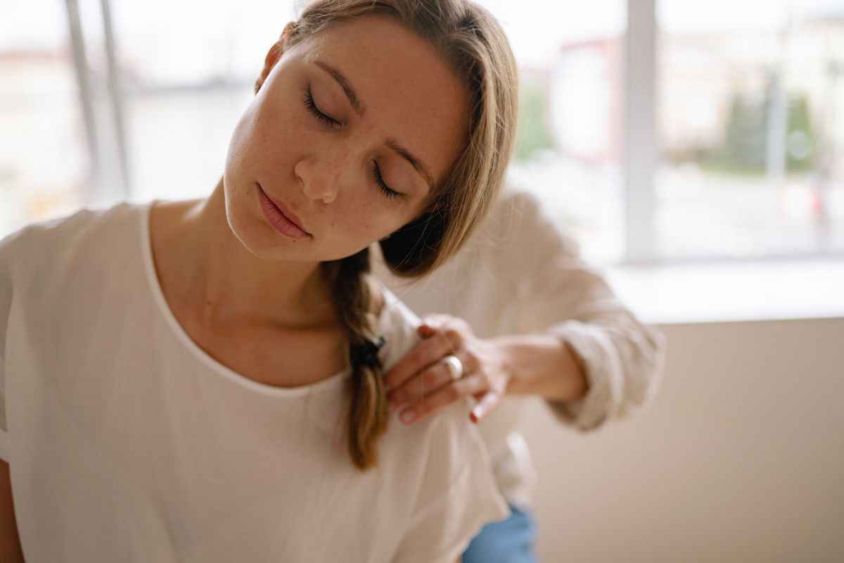 A soothing massage session at a spa, highlighting relaxation and wellness indoors.