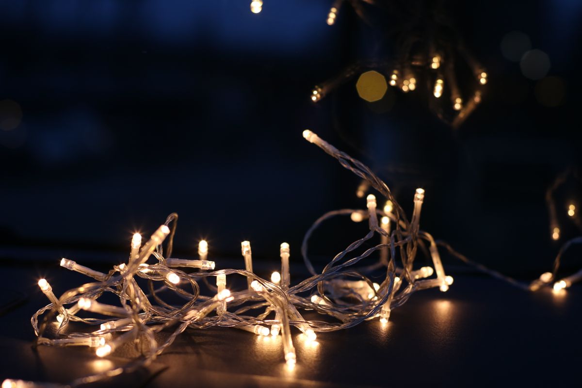 Warm glowing string lights create a cozy ambiance in the evening.