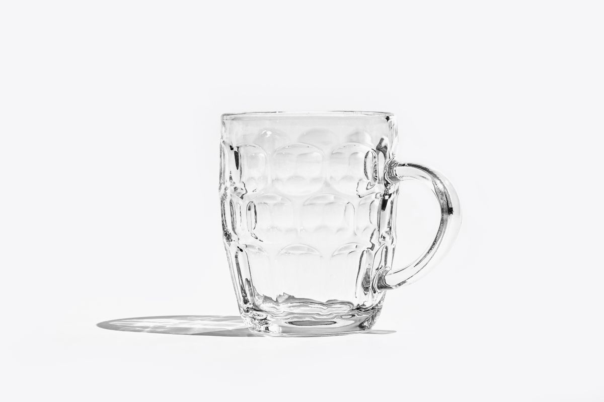 High-quality image of a transparent glass mug with shadow, perfect for minimalist design projects.