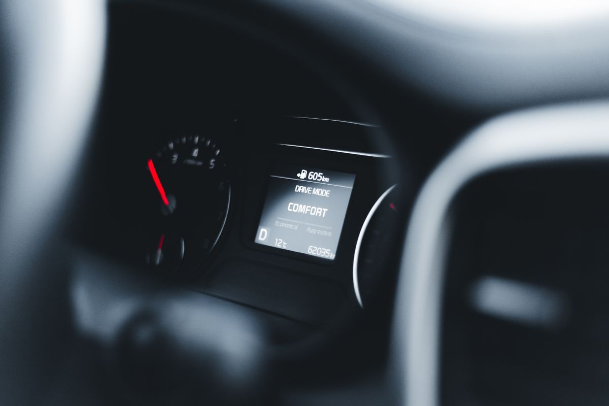 Close-up view of a car dashboard displaying comfort drive mode for enhanced experience.