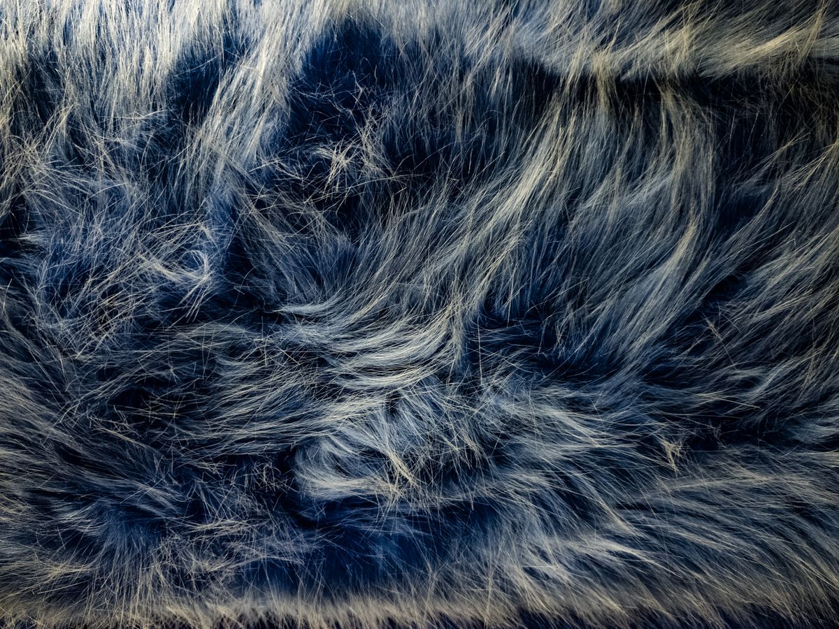 Close-up of elegant soft blue faux fur creating a luxurious texture effect.