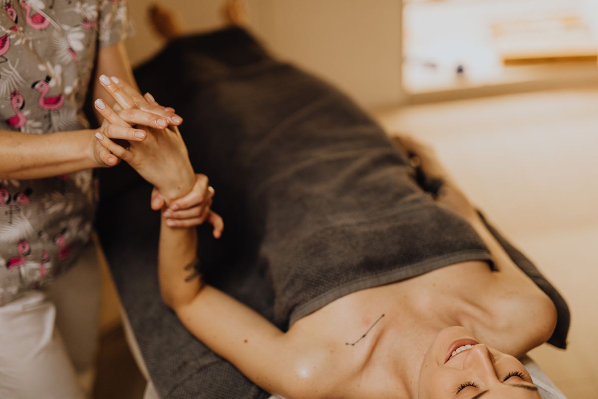 Experience therapeutic relaxation with a professional hand massage, enhancing wellness.