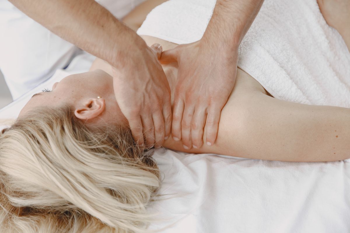 Relaxing massage therapy session featuring neck and shoulder techniques in a calming environment.