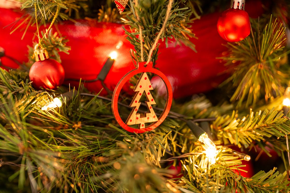 Close-up image of a decorated Christmas tree with lights and ornaments.
