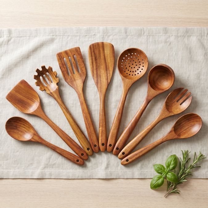 Teak utensil set fanned out, ready to gift