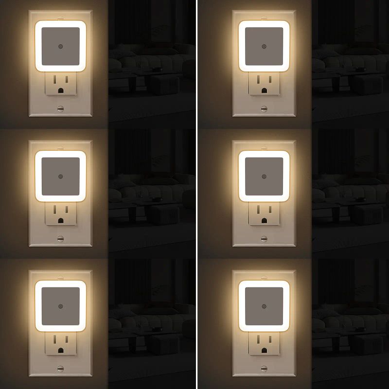 Soft Glow Nights warm white plug-in night lights glowing