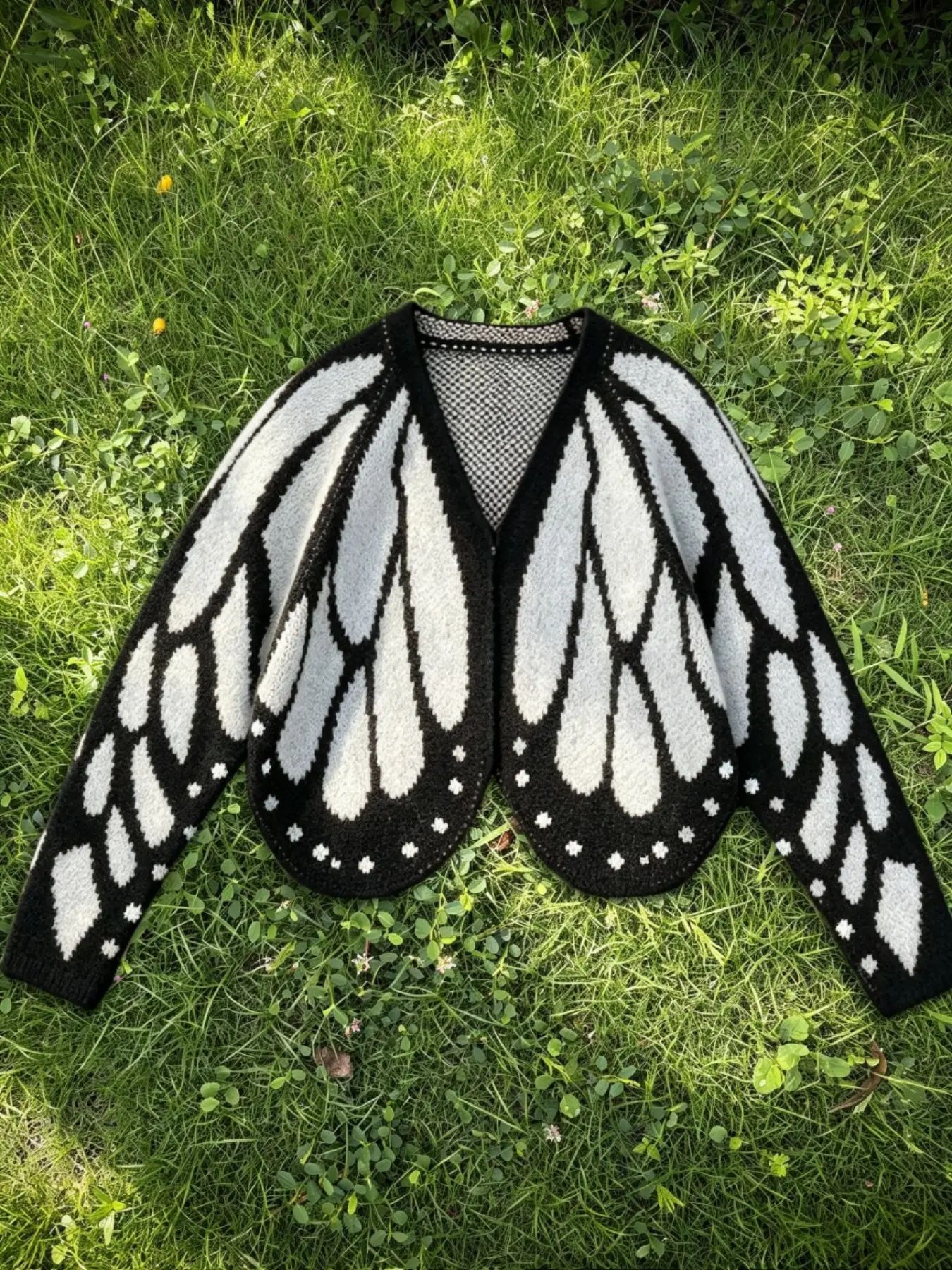 The white and black butterfly wing knit cardigan