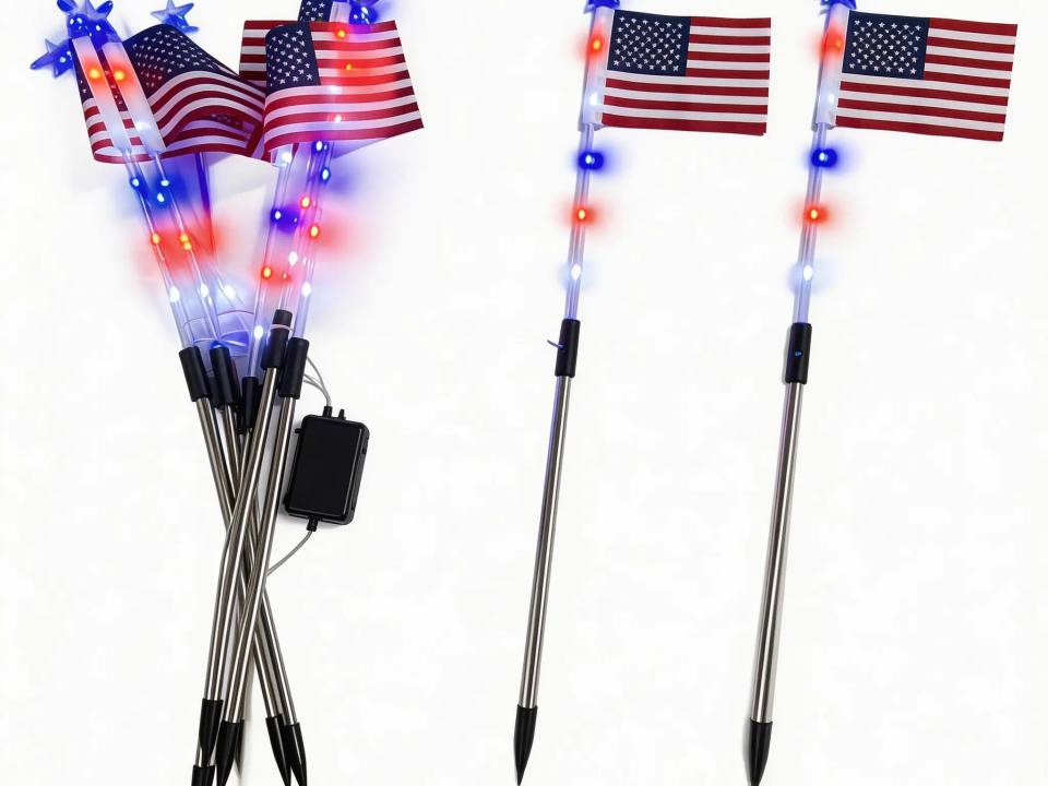 Close-up of the American flag solar stake lights and solar panel