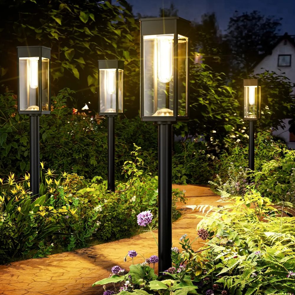 Waterproof Solar Garden Pathway Light illuminating a garden path at night