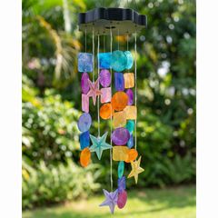 The chime hanging in a garden in daylight