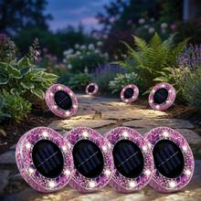 Pink circle mosaic solar disk lights glowing