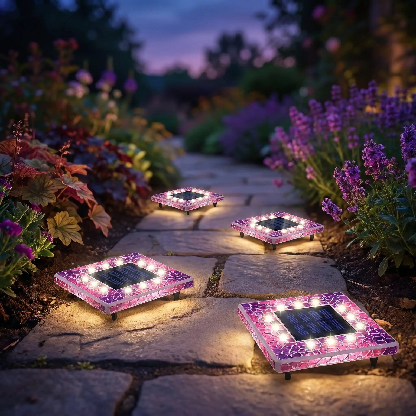 Pink square mosaic solar disk lights in a flower bed