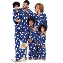Family in matching navy polar bear pajamas