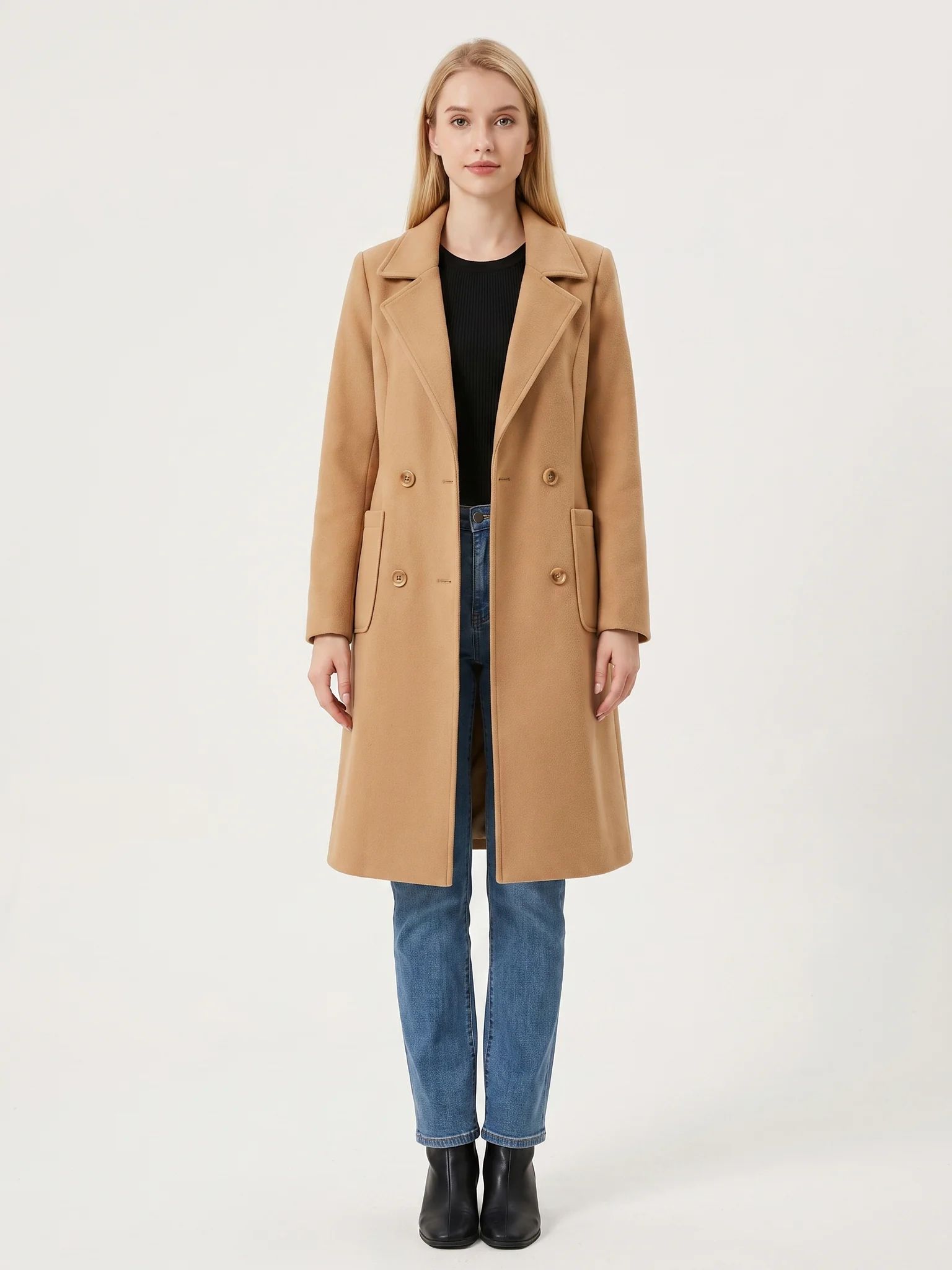 The Camel wool-blend coat worn open on a model, photographed from the front in a studio