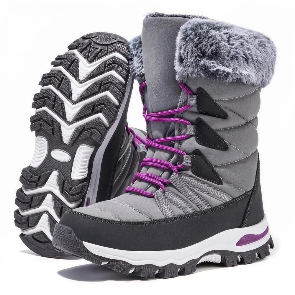 The boot beside its own outsole, showing the seam-sealed upper and the lug tread
