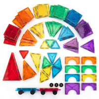 Full 100-piece set laid out with 2 magnetic cars